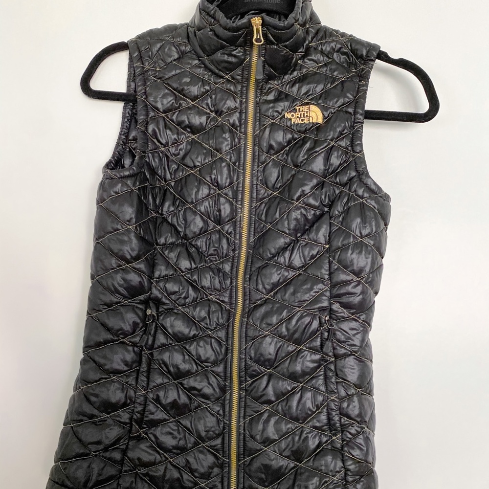 The North Face Black and Gold Puffer Vest